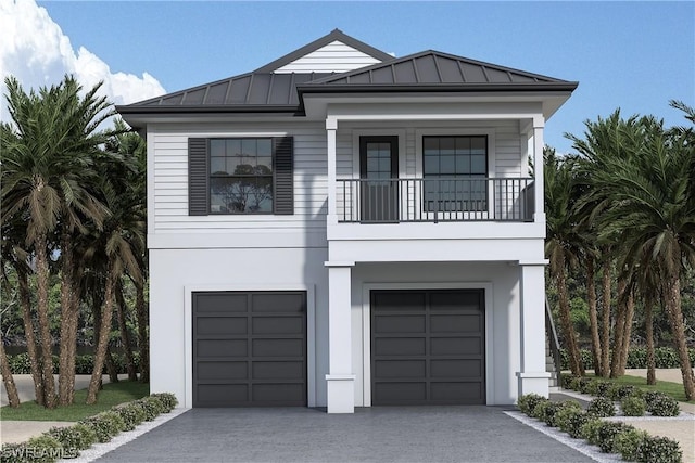 view of front of house featuring a balcony and a garage