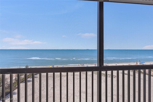 view of water feature with a beach view