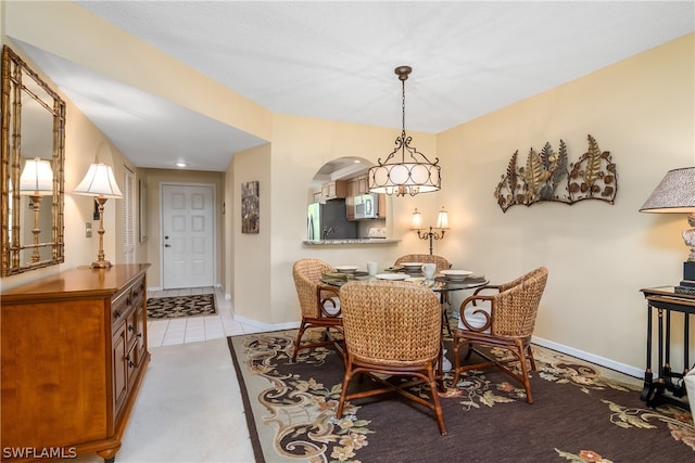 dining room featuring light tile patterned floors