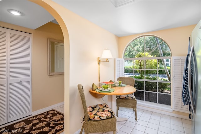 dining room featuring light tile patterned flooring