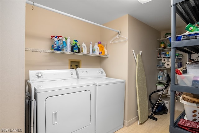 laundry room with washer and clothes dryer