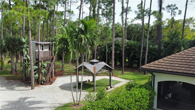 view of property's community featuring a gazebo and a carport