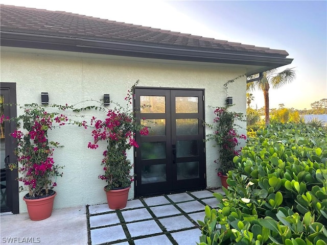 view of exterior entry with french doors