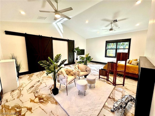 living room featuring ceiling fan, a barn door, and vaulted ceiling