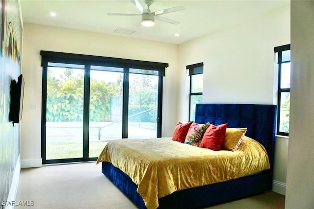 bedroom featuring carpet, ceiling fan, and access to outside