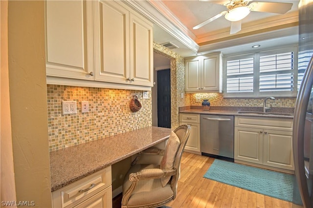 kitchen featuring decorative backsplash, stainless steel dishwasher, crown molding, sink, and light hardwood / wood-style flooring