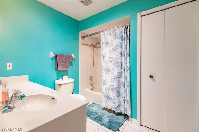 full bathroom with toilet, vanity, tile patterned floors, and shower / tub combo with curtain