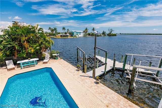 view of dock with a fenced in pool, a water view, and a patio