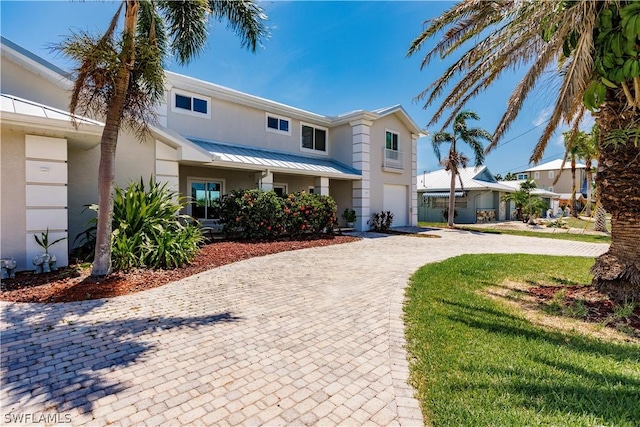 view of front of home with a front lawn