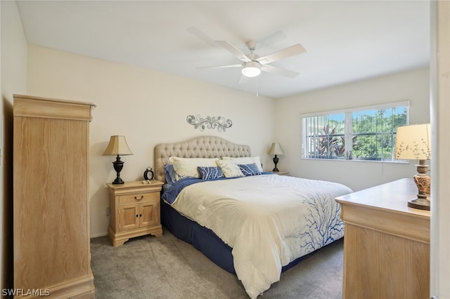 bedroom featuring ceiling fan and carpet floors