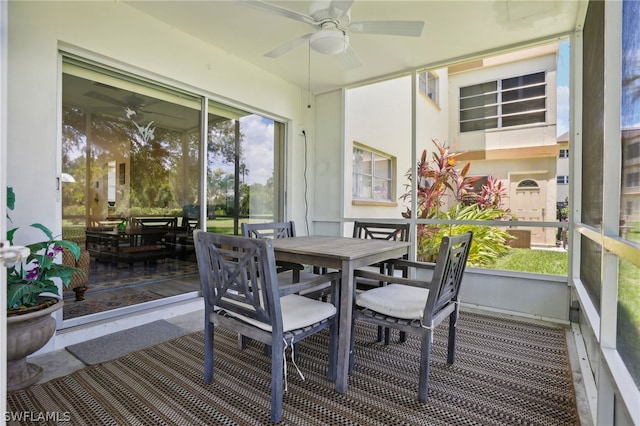 sunroom / solarium with ceiling fan