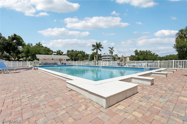 view of pool with a patio