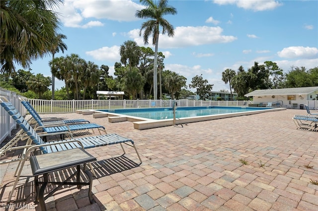 view of pool featuring a patio area