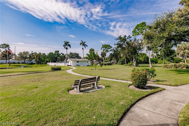 view of community featuring a yard