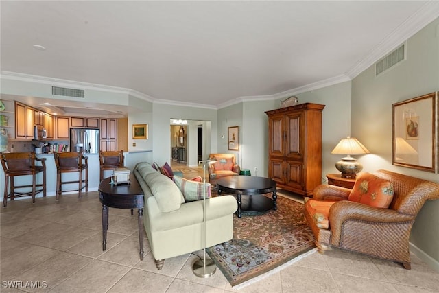 living room with light tile patterned flooring and ornamental molding