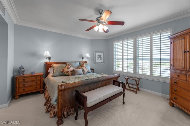 bedroom with light colored carpet, crown molding, baseboards, and a ceiling fan