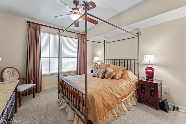 bedroom featuring ceiling fan and light colored carpet