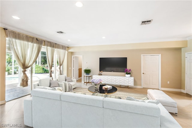 tiled living room featuring ornamental molding