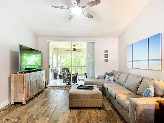 living room featuring ceiling fan