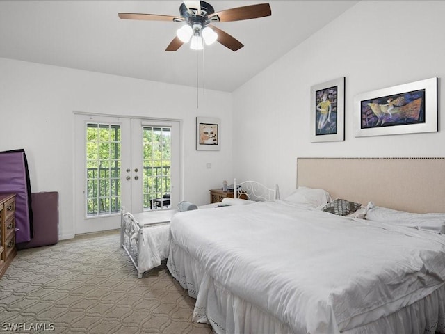 carpeted bedroom featuring lofted ceiling, access to exterior, french doors, and ceiling fan