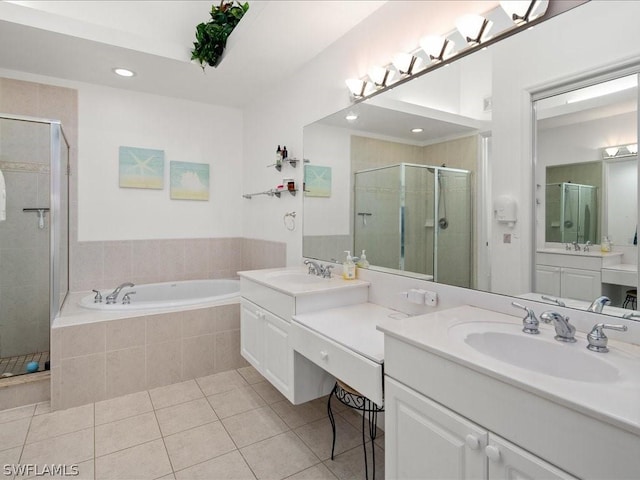 bathroom with vanity, tile patterned floors, and shower with separate bathtub