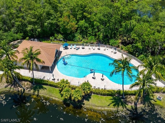 view of swimming pool featuring a patio area