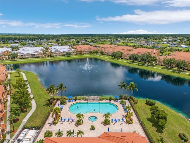 bird's eye view with a residential view and a water view
