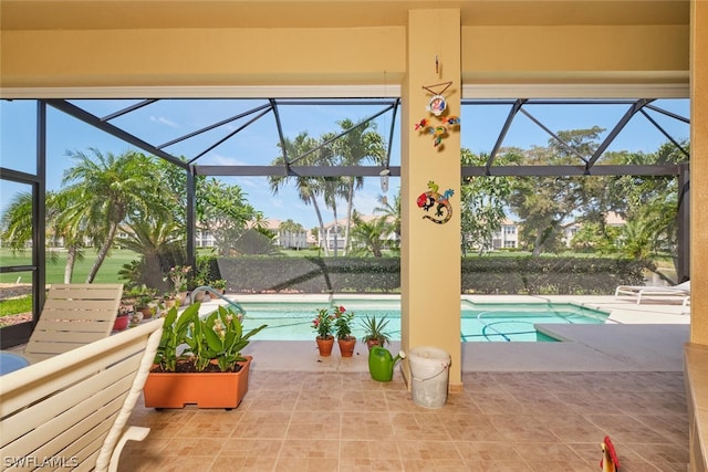 view of pool featuring a patio area and a lanai