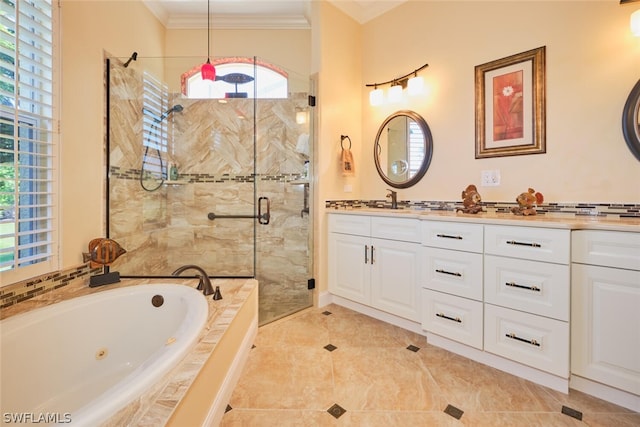 bathroom featuring vanity, independent shower and bath, and ornamental molding