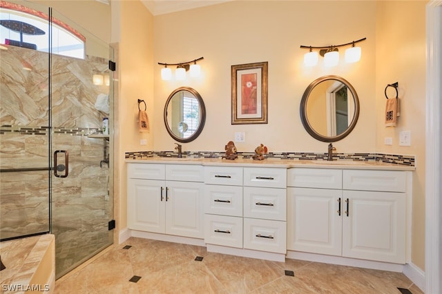 bathroom with vanity and an enclosed shower