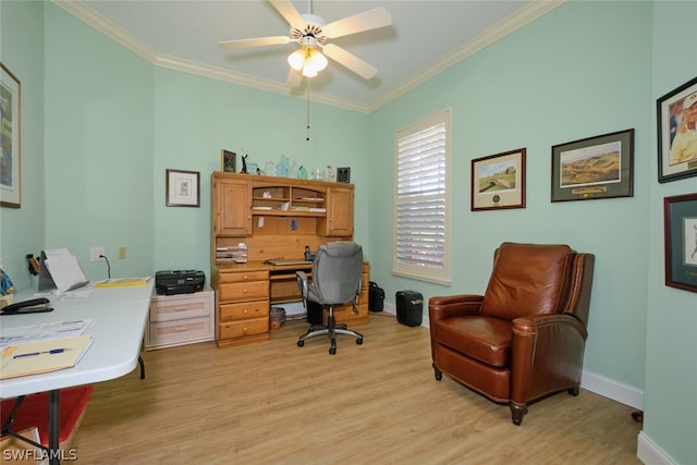 home office featuring light wood-type flooring, ceiling fan, and crown molding