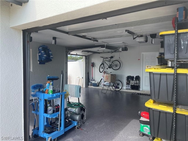 garage featuring a garage door opener