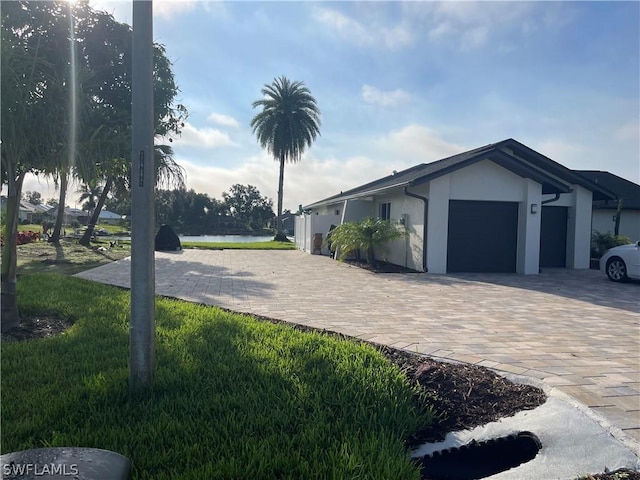 view of property exterior with a garage