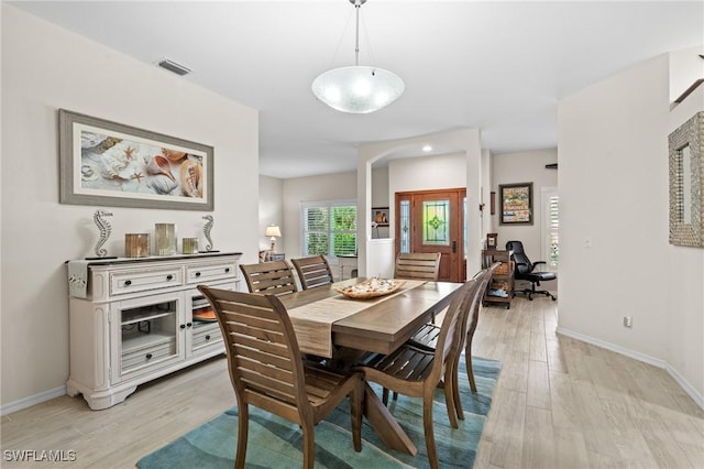 dining room featuring light hardwood / wood-style flooring