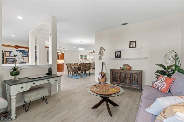 living room with ceiling fan