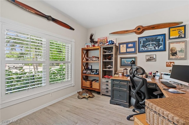 office area with light wood-type flooring