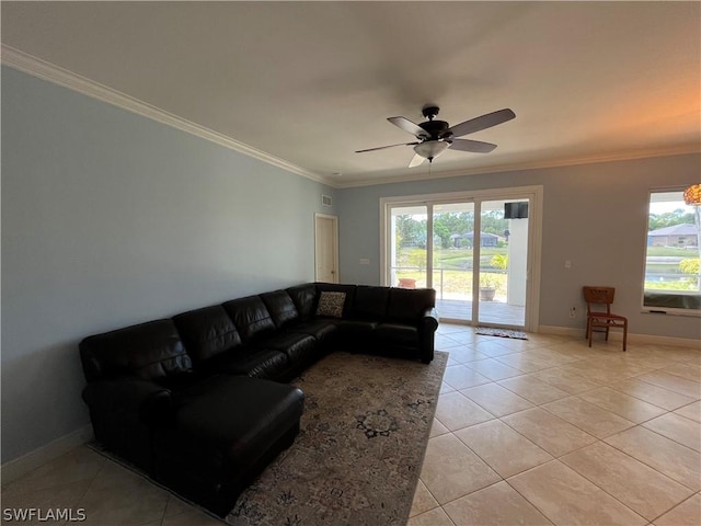 tiled living room featuring ceiling fan and crown molding