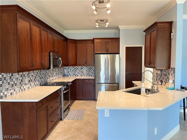 kitchen featuring sink, decorative backsplash, light tile patterned floors, kitchen peninsula, and stainless steel appliances