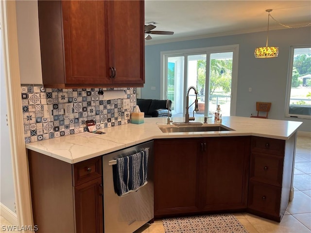 kitchen featuring kitchen peninsula, ceiling fan, sink, dishwasher, and hanging light fixtures