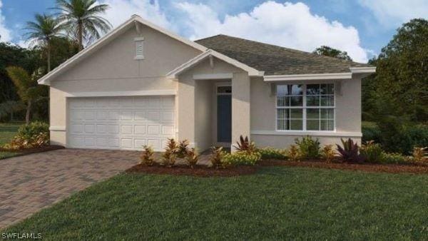 single story home featuring a garage and a front lawn