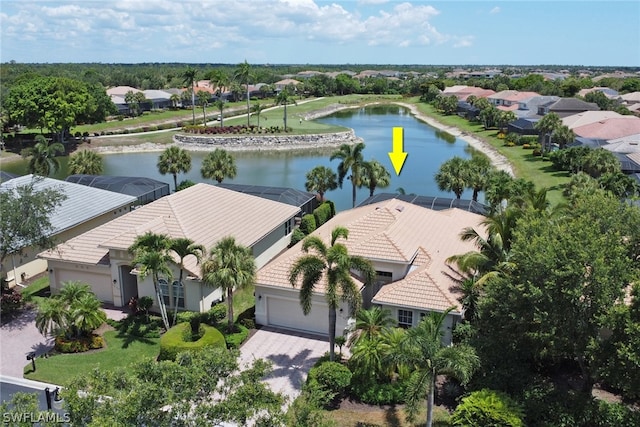 birds eye view of property featuring a water view