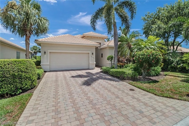 view of front of home with a garage