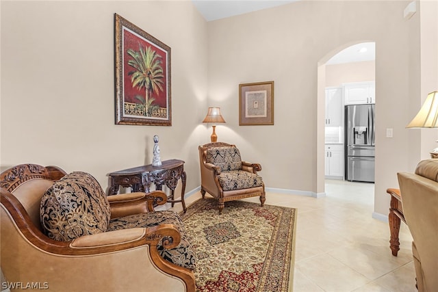 living area with light tile patterned floors