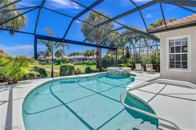 view of pool with an in ground hot tub, a patio, and glass enclosure