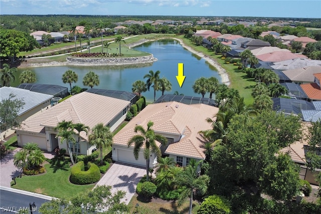 birds eye view of property featuring a water view