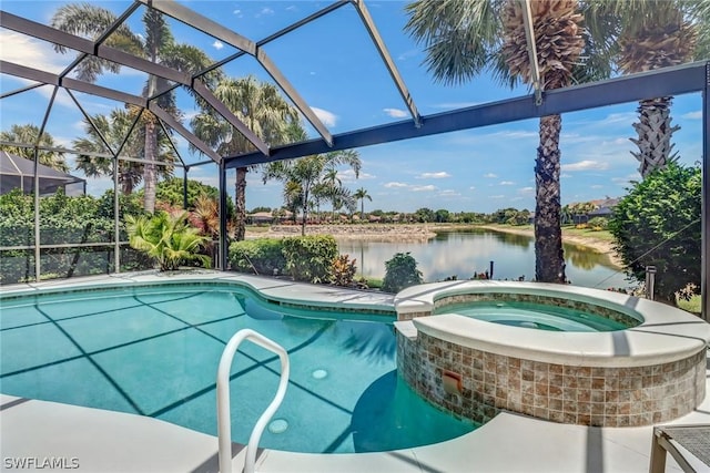 view of pool featuring an in ground hot tub, a water view, and glass enclosure