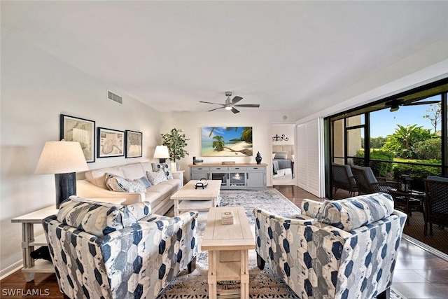 living room featuring ceiling fan