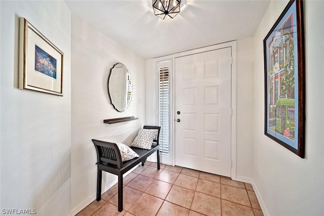 entryway featuring light tile patterned floors