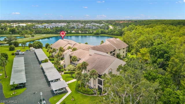 birds eye view of property featuring a water view