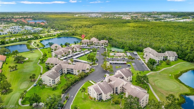 aerial view with view of golf course and a water view